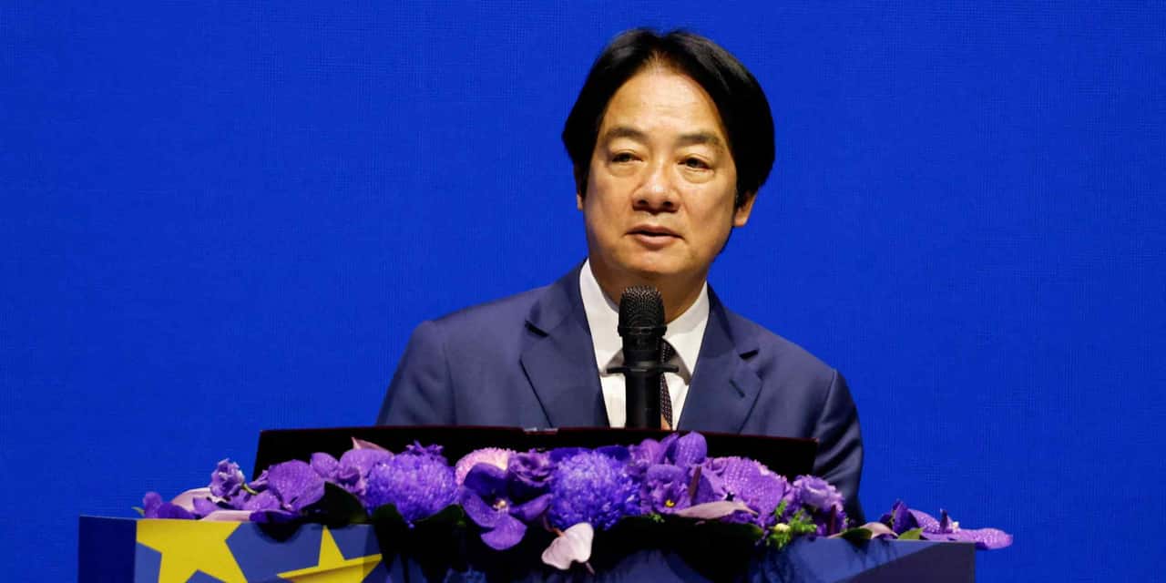 Taiwan labor minister makes rare trip to China for APEC meeting