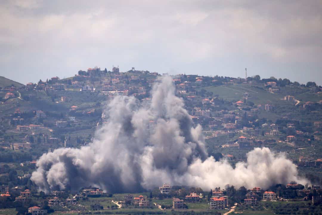 Israeli forces bomb homes and start fires in southern Lebanon