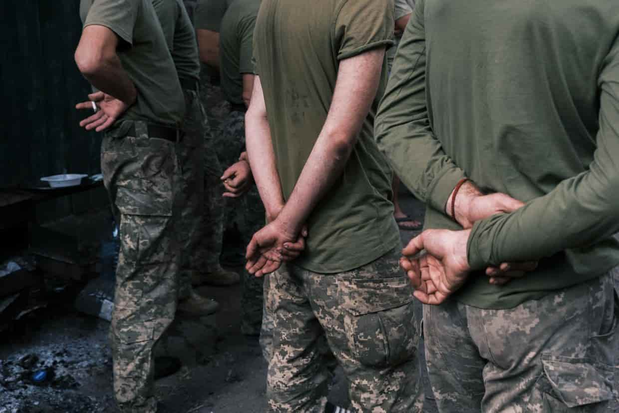 Zelensky signs law granting full rights to convict soldiers
