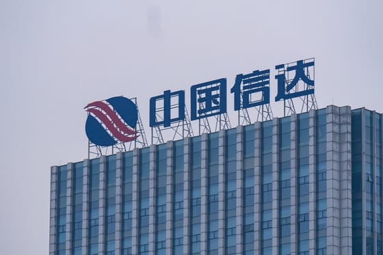 China Cinda Warns of 60%-70% Profit Drop Amid Property Downturn