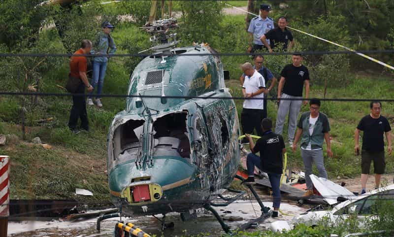 Pilot dies after small plane crashes into Beijing's China Zun skyscraper