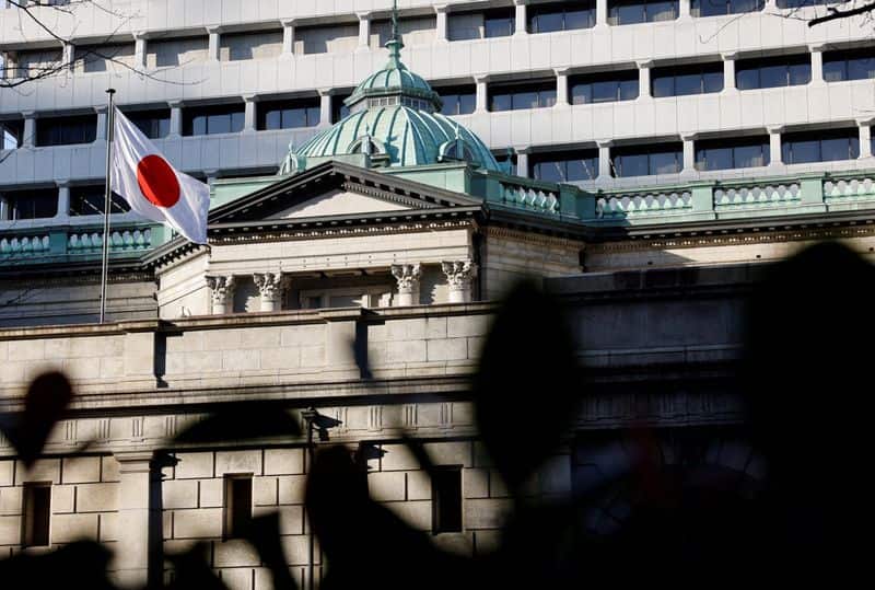 BOJ's Sato urges vigilance on yen's inflation impact