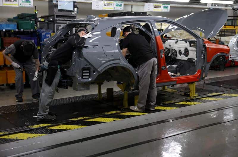 UK manufacturing cools in June despite stockpiling, PMI shows