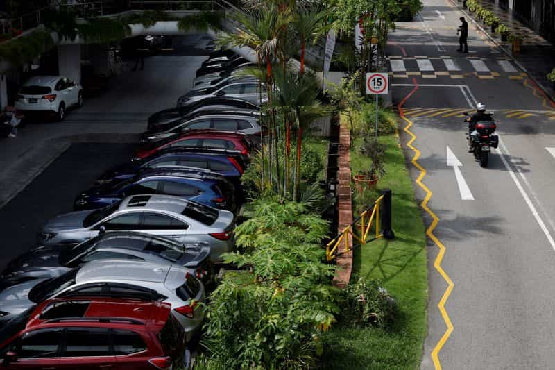Singapore car ownership certificates hit record high near $100,000