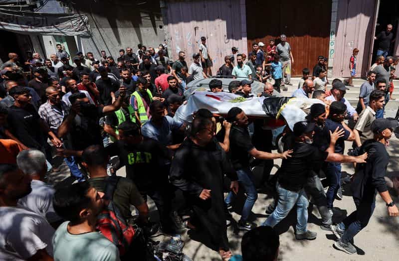 Gazans mourn aid worker killed by Israel who brought them the World Cup
