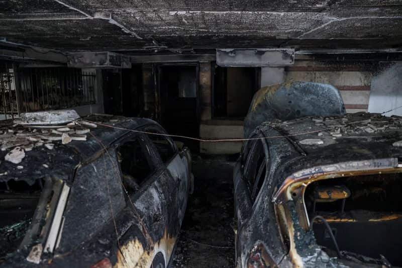 Three arrested over firebombings linked to Greek ruling party