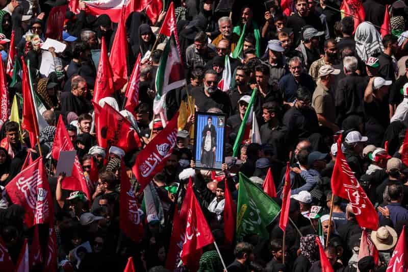 Trump threatens Iran with '1000 missiles' after funeral chants