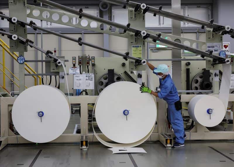 Japan manufacturers upbeat on chip demand, services hit by costs