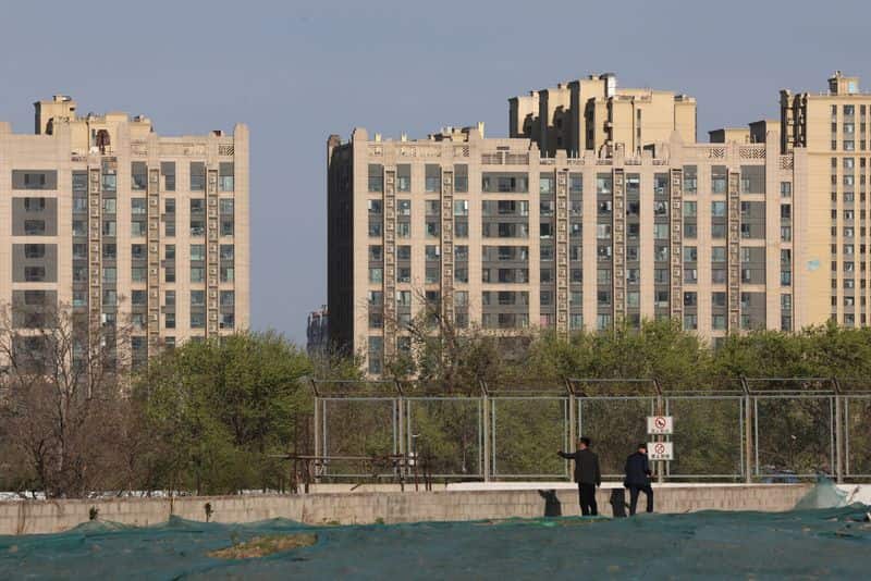 China June new home prices fall at slower pace