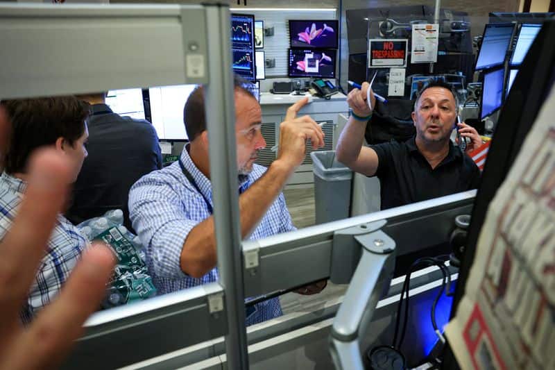 Wall St futures fall as chip selloff deepens; Netflix tumbles