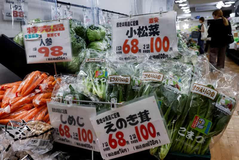 Japan cuts growth outlook as energy costs weigh