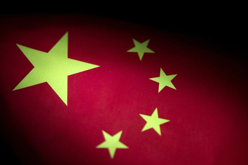 China conducts naval, air patrols around disputed shoal in South China Sea