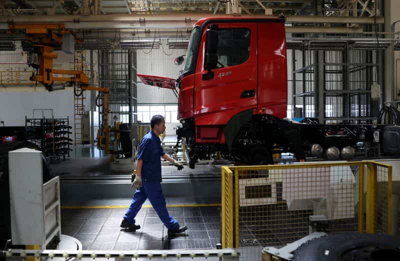 China factory growth slows to 4-month low in July, survey shows