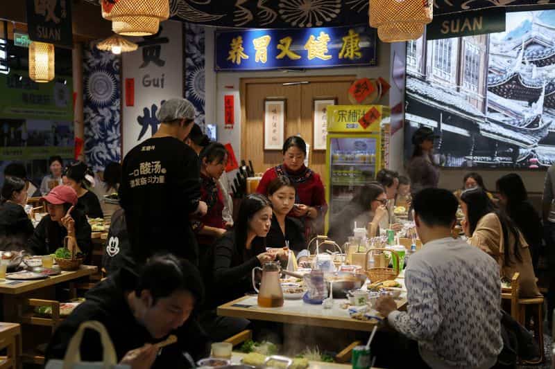 China services growth slows to 10-month low in July