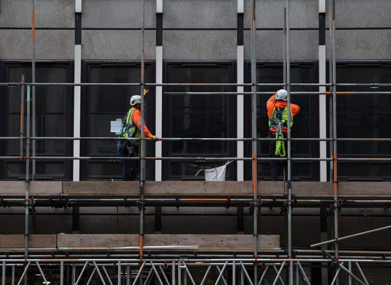 UK construction downturn eases in July, PMI shows