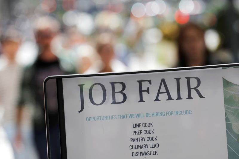 US jobless claims rise slightly, July layoffs hit two-year low