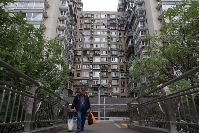 Beijing Eases Homebuying Curbs for Non-Local Families