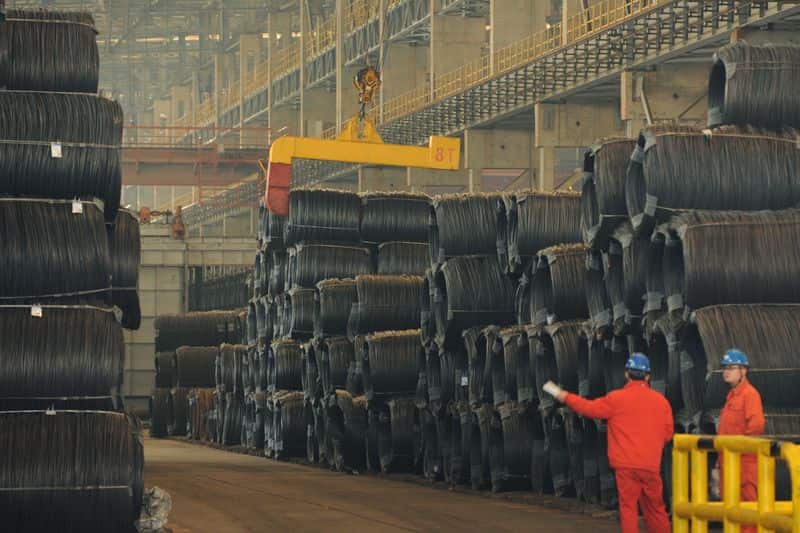 China's producer inflation eases in July, below expectations