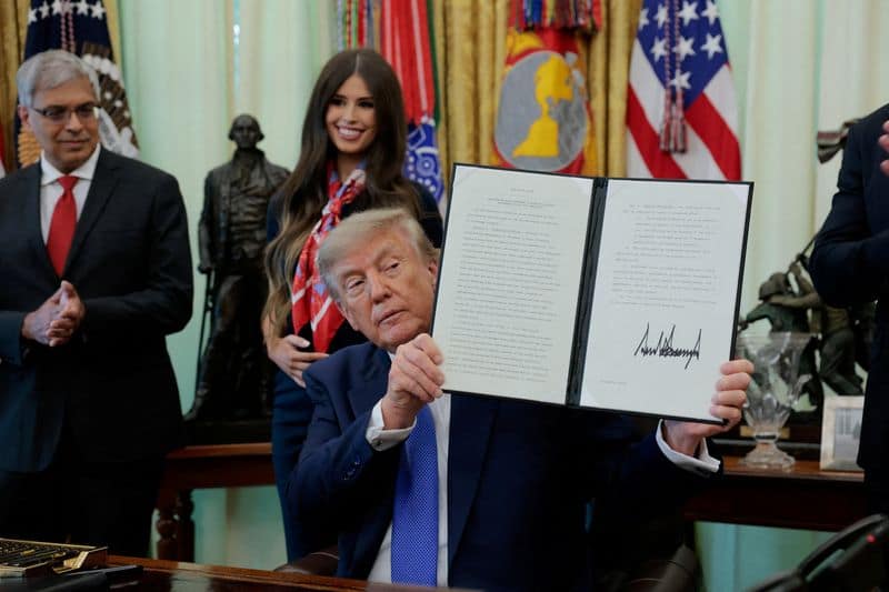 Trump signs order reducing childhood vaccines, challenging state laws