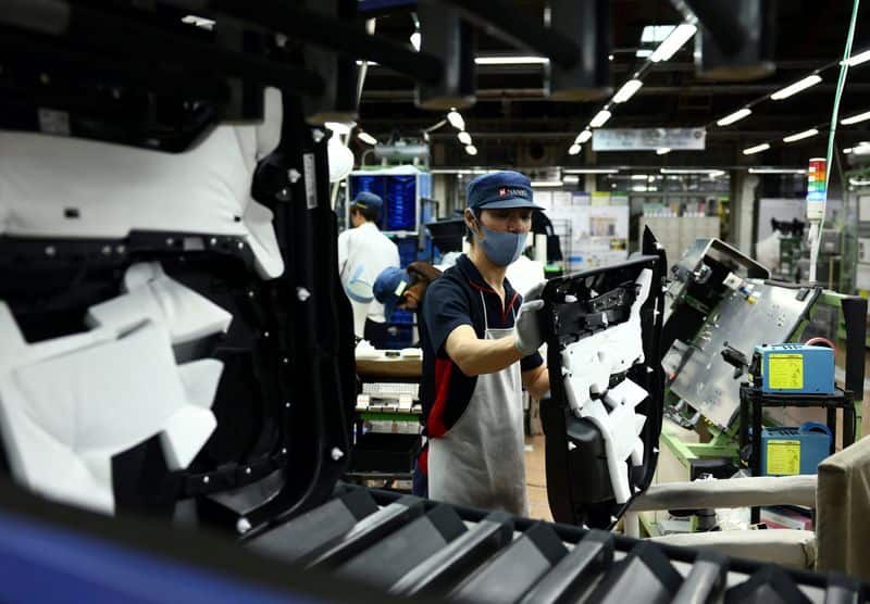 Japan business confidence rises on strong semiconductor demand