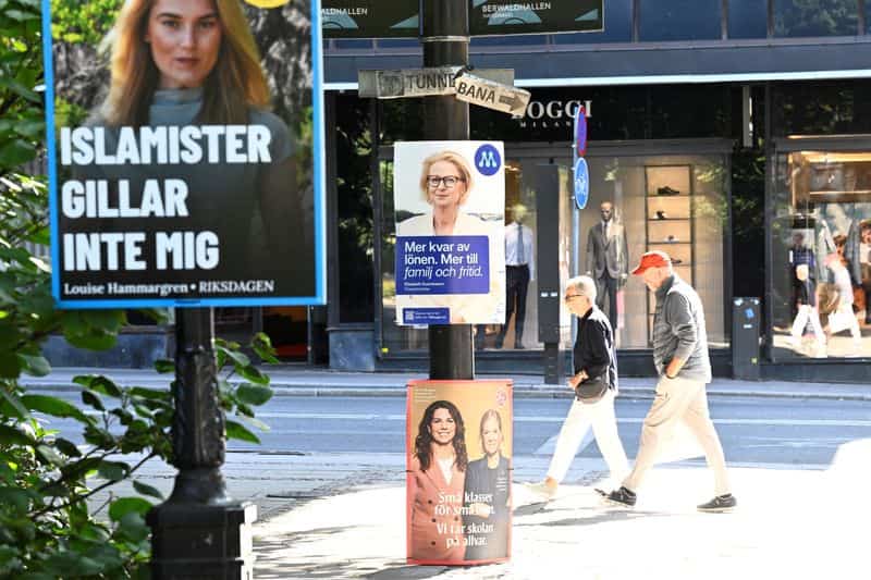 Sweden's ruling coalition narrows gap with opposition ahead of election