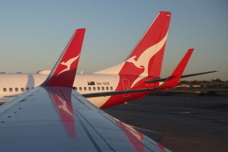 Qantas profit falls 14% on higher fuel costs, beats estimates