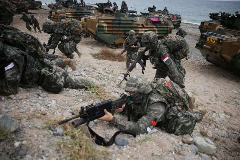 North Korea vows strong response to US arms sale; trilateral drills planned