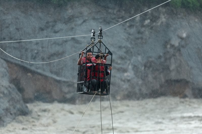 Nepal to rebuild 20,000 homes after devastating floods, search for missing continues