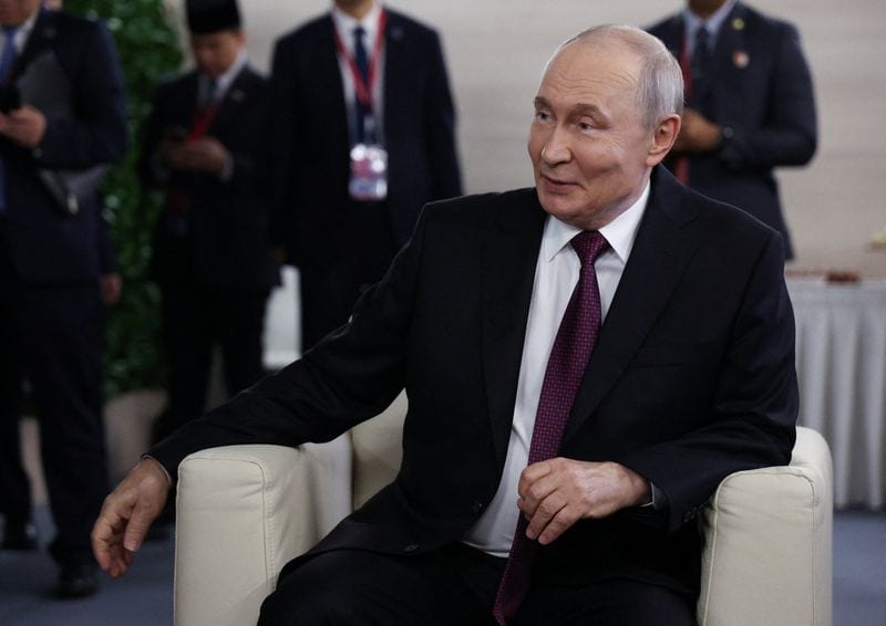 Putin says Russia can manage growing budget deficit, sees peace deal chance