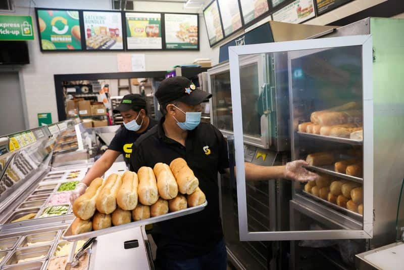 US services sector activity accelerates in August on strong demand