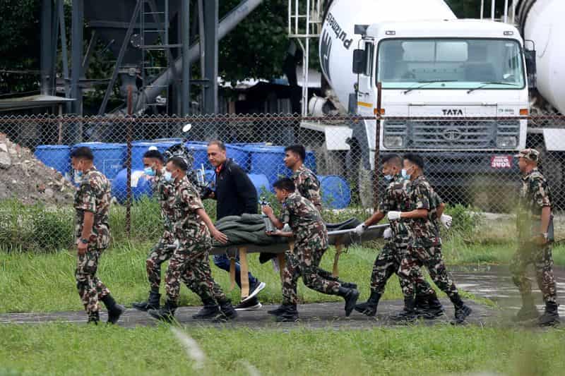Nepal mourns 1,300 killed in floods, search continues