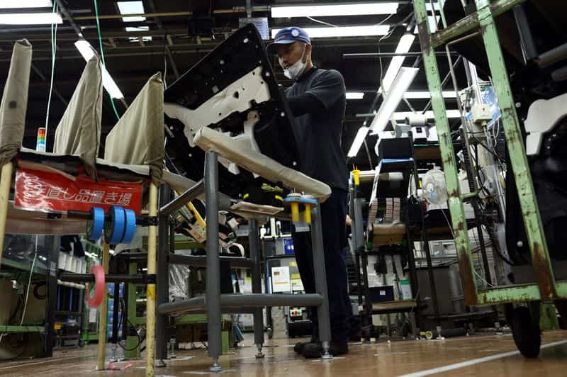 Japan manufacturers' mood hits near 5-year high on semiconductor demand