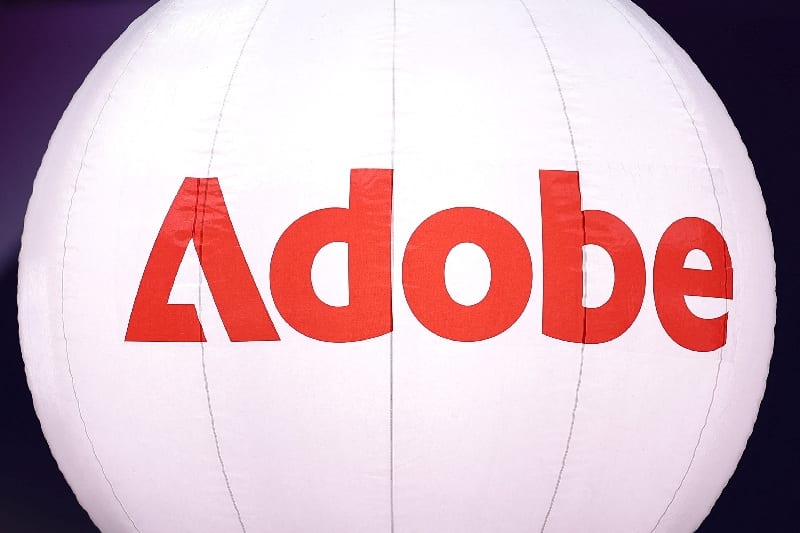 Adobe beats third-quarter revenue estimates