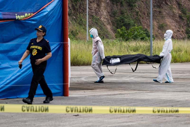 Philippine ferry fire death toll rises to 76 as identification efforts begin