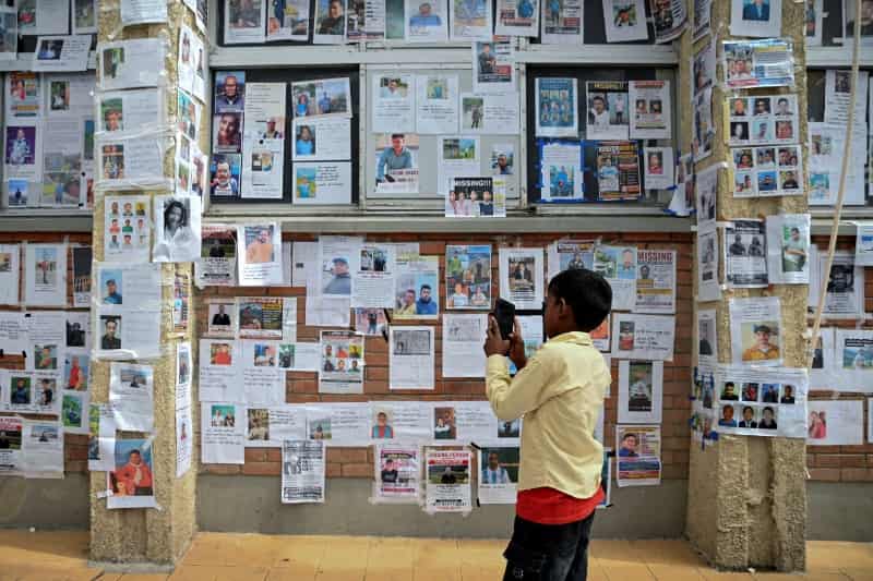 Families of missing flood victims hold onto hope weeks after disaster