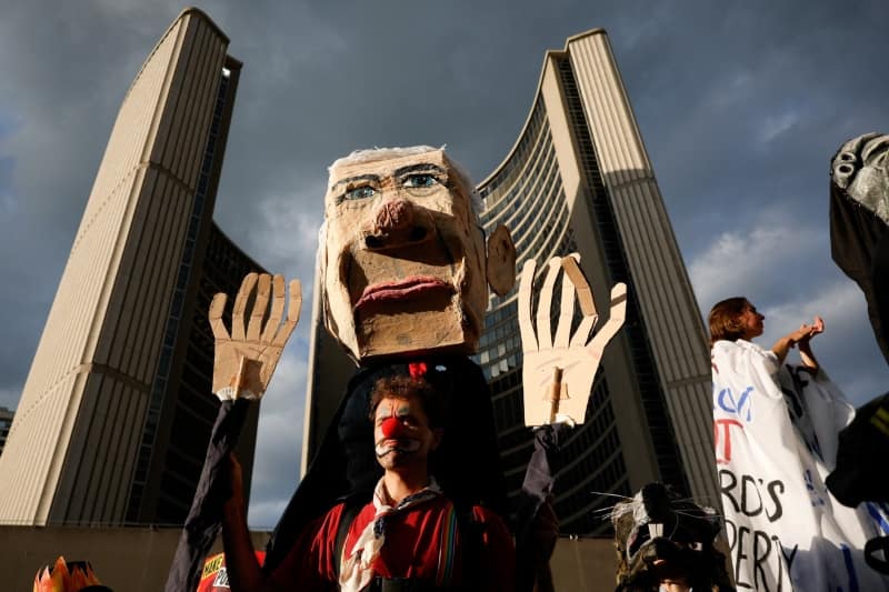 Hundreds protest Mark Carney's investment summit in Toronto