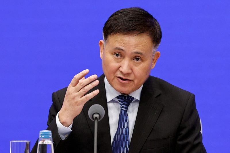 China's slower loan growth is the new normal, central bank governor says