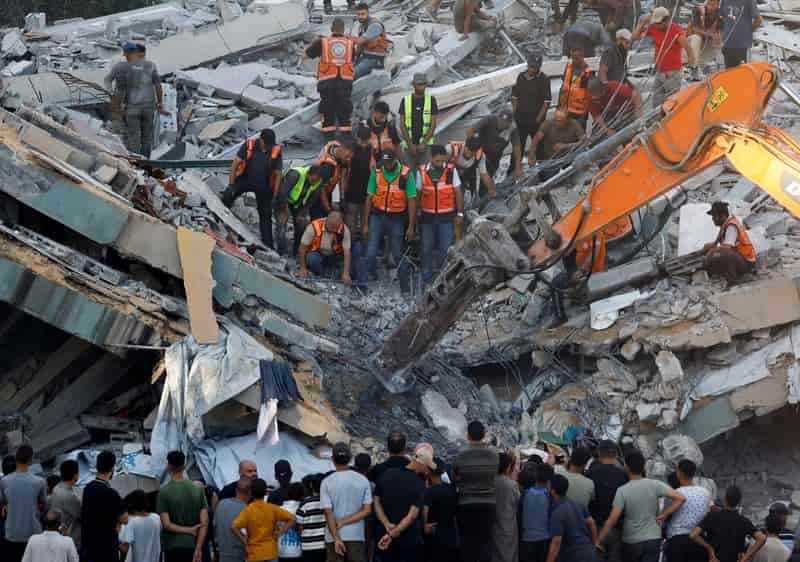 Gaza building collapse kills 12, traps dozens amid war damage
