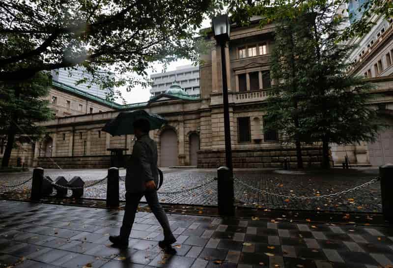 BOJ raises rates but lags peers, yen weakens