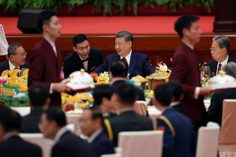 China's Xi Jinping stresses economic goals, Taiwan reunification