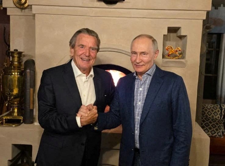 Merz 'outraged' by Schroeder's attendance at Putin's birthday
