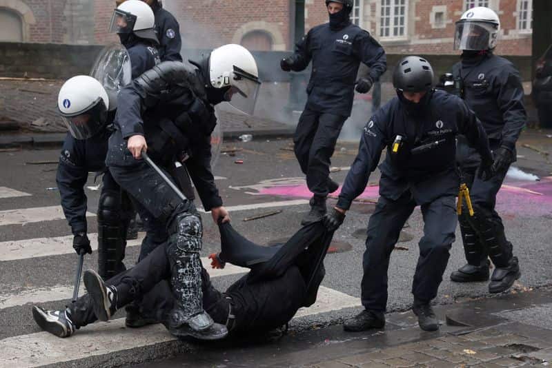 Protesters clash with police in Brussels during national strike