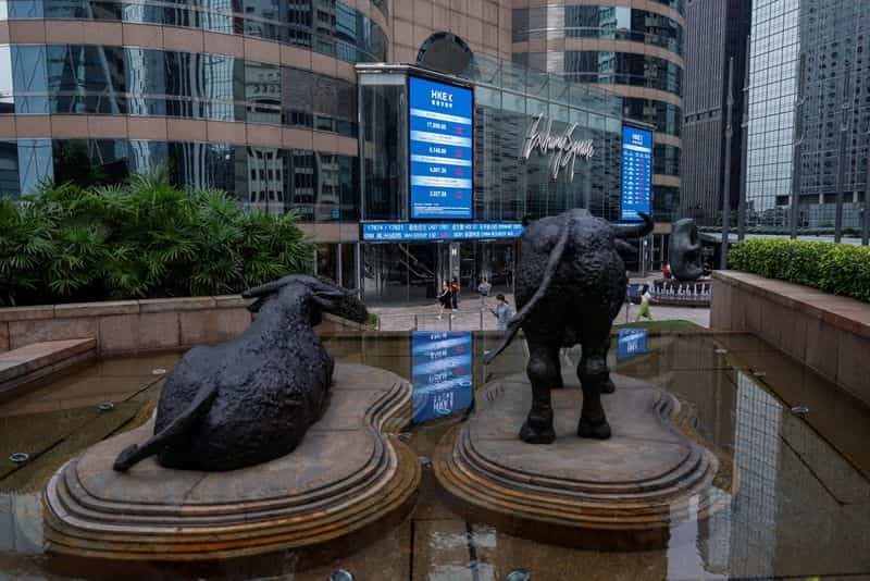 Asian stocks skid, Wall Street futures aided by oil slip