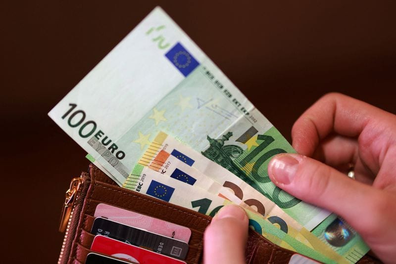 Dollar firms, euro weakens as French protests turn violent