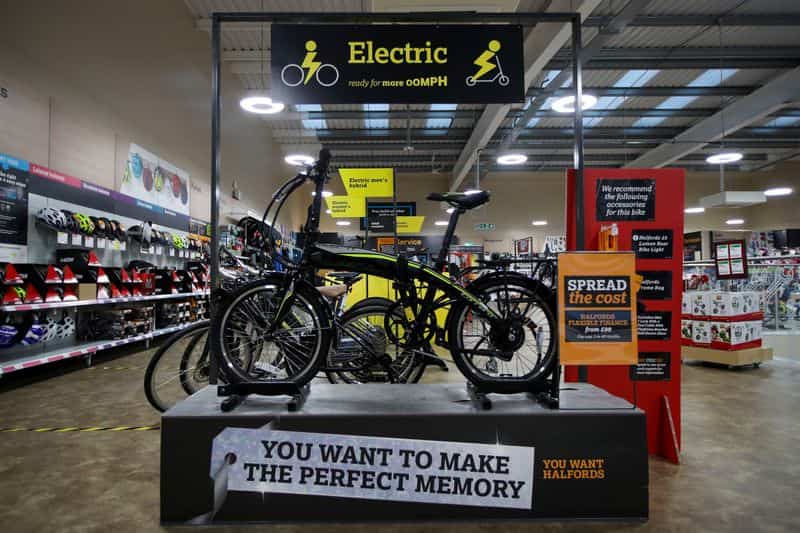 Halfords sales rise 7.1% on summer boost, profit forecast retained