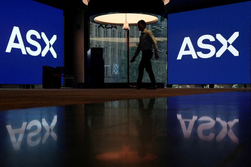 ASX says 'turning point' reached amid tech overhaul, maintains lower dividend
