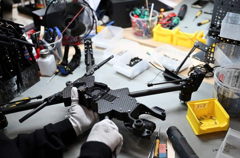 German business activity growth softens in October, PMI shows
