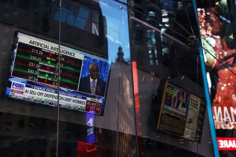 US futures dip as AI stocks slide, telecoms fall on competition fears