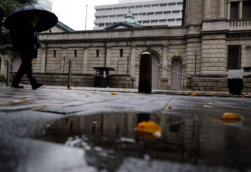 Ex-BOJ chief Kuroda backs more rate hikes, ex-deputy urges caution