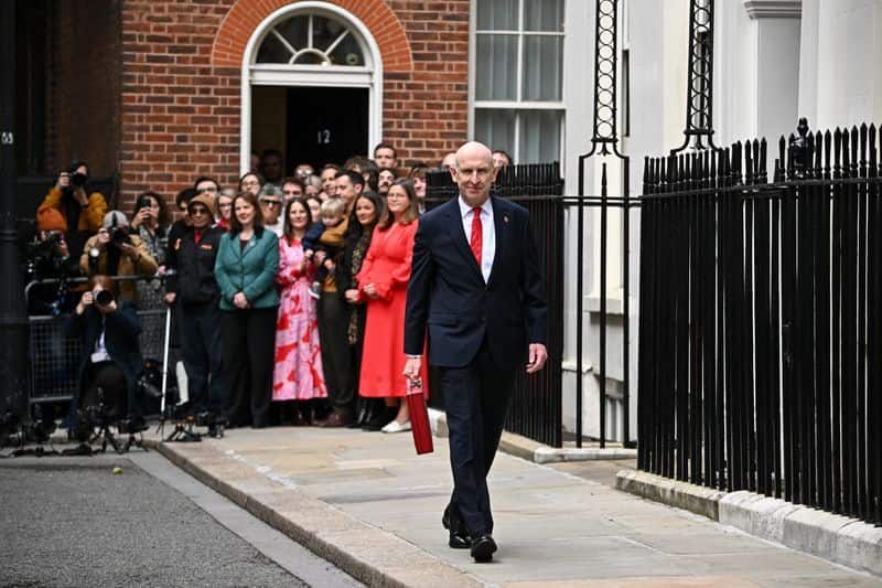 UK's Healey offers billions in household help, raises bank taxes